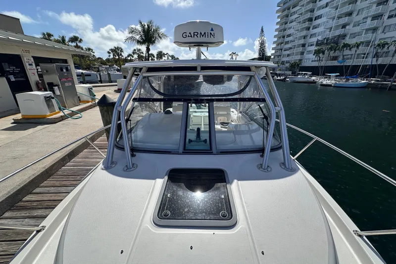  Yacht Photos Pics 2006 Boston Whaler 285 Conquest docked at marina with Garmin equipment.