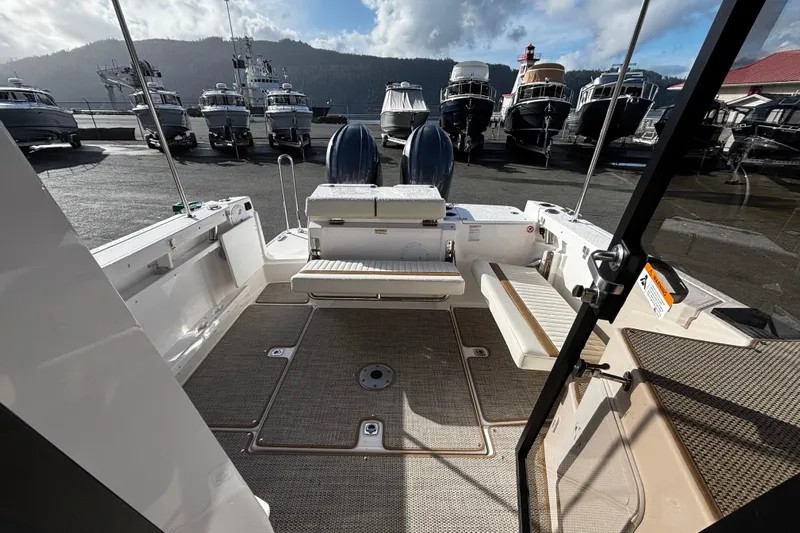  Yacht Photos Pics Interior view of 2026 Ranger Tugs R-27 boat at the harbor.