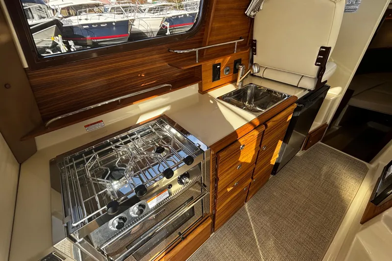  Yacht Photos Pics Interior of Ranger Tugs R-27 yacht kitchen, model year 2026.