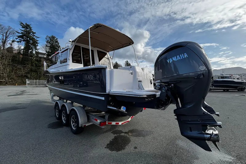  Yacht Photos Pics 2026 Ranger Tugs R-27 with Yamaha engine on trailer.