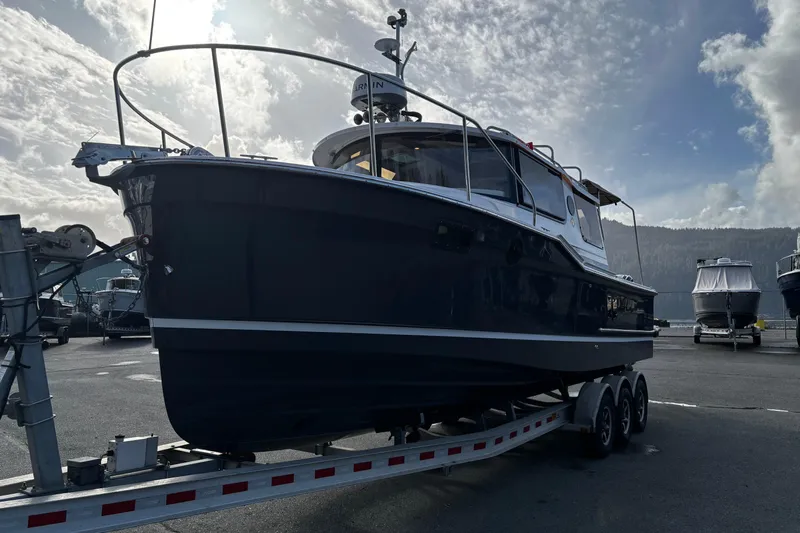  Yacht Photos Pics 2026 Ranger Tugs R-27 boat on a trailer.