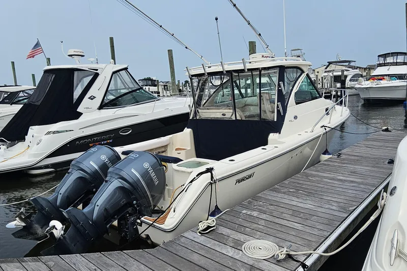  Yacht Photos Pics 2009 Pursuit OS 315 Offshore boat docked with twin Yamaha engines.