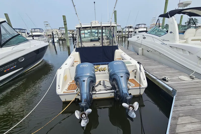  Yacht Photos Pics 2009 Pursuit OS 315 Offshore boat docked with twin 250 horsepower engines.
