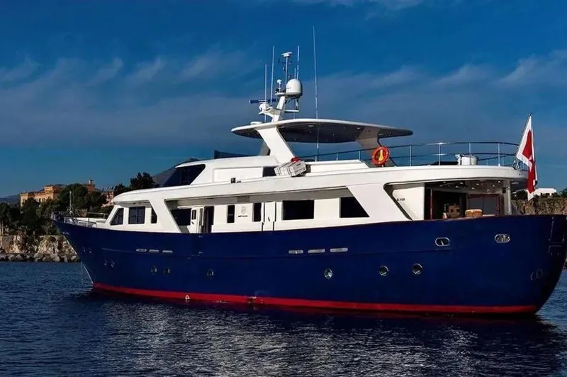  Yacht Photos Pics Luxury yacht Benetti Sail Division 105, 2002 model, cruising on calm waters.