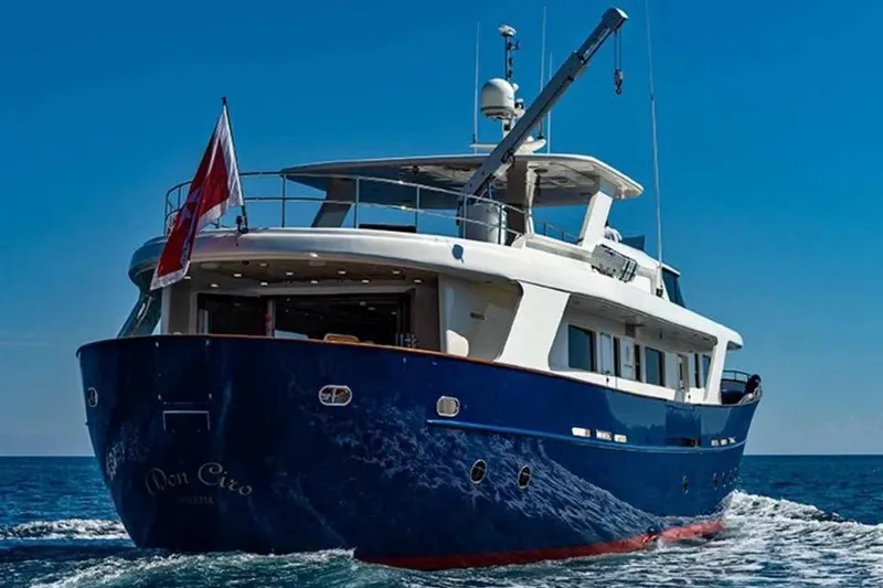  Yacht Photos Pics Luxury yacht Benetti Sail Division 105, 2002 model, cruising on open sea.