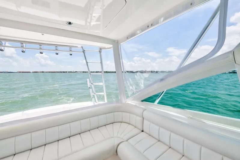 Yacht Photos Pics Interior view of 2010 Cabo 45 Express yacht with ocean backdrop.