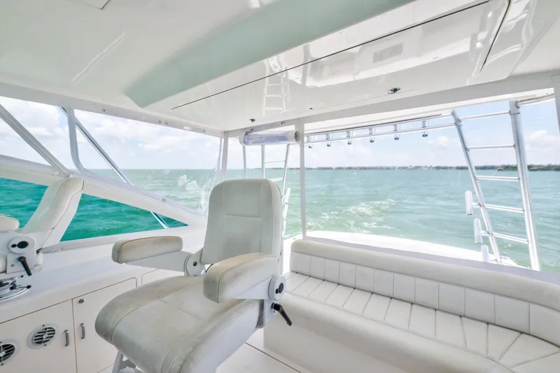  Yacht Photos Pics Interior view of 2010 Cabo 45 Express yacht with ocean backdrop.