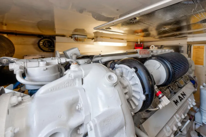  Yacht Photos Pics Engine room of 2010 Cabo 45 Express yacht, featuring a MAN engine.