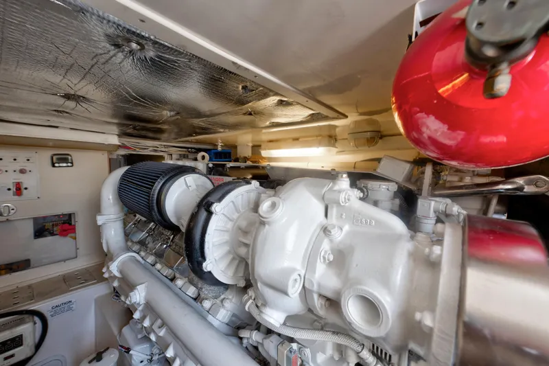  Yacht Photos Pics Engine room of 2010 Cabo 45 Express boat, featuring a powerful marine engine.
