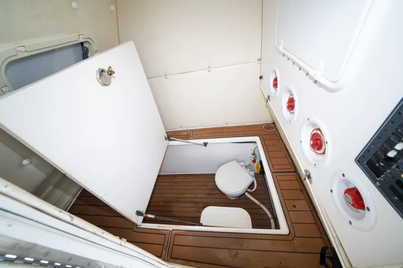 Hoo Hunter Yacht Photos Pics 2012 SeaHunter 37 Tournament boat interior with open hatch and marine toilet.