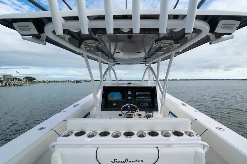Hoo Hunter Yacht Photos Pics 2012 SeaHunter 37 Tournament boat dashboard with navigation screens on open water.