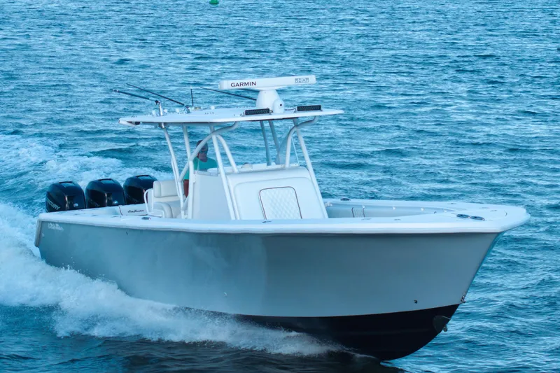 Hoo Hunter Yacht Photos Pics 2012 SeaHunter 37 Tournament boat cruising on open water.