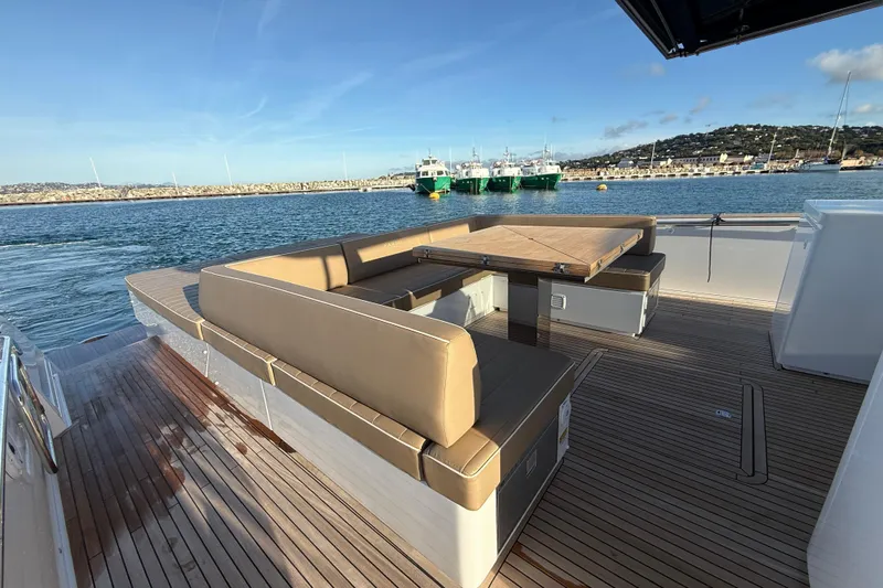Five 3 Yacht Photos Pics Luxurious 2024 Pardo Yachts 50 with spacious deck seating and scenic harbor view.