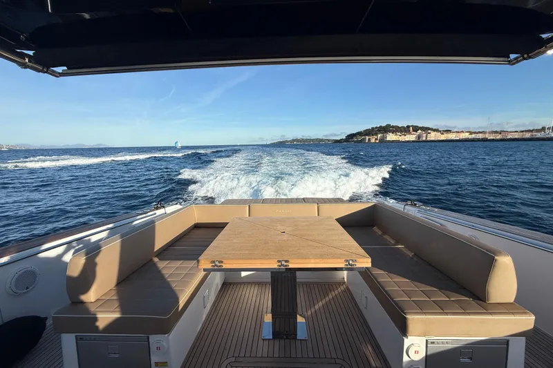 Five 3 Yacht Photos Pics 2024 Pardo Yachts 50 cruising with scenic ocean view and luxurious seating area.