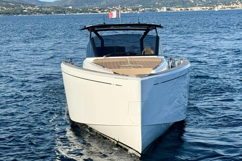 Five 3 Yacht Photos Pics 2024 Pardo Yachts 50 cruising on open water, showcasing sleek design and luxury features.