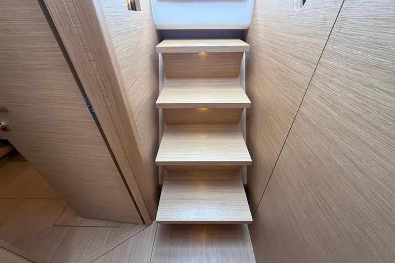 Five 3 Yacht Photos Pics Wooden staircase with ambient lighting inside 2024 Pardo Yachts 50 model.