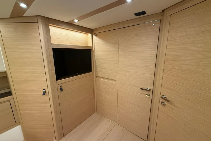 Five 3 Yacht Photos Pics Luxurious interior of 2024 Pardo Yachts 50 with sleek wood paneling and modern design.