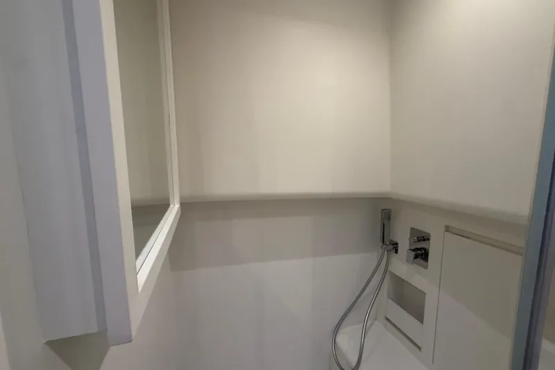Five 3 Yacht Photos Pics Modern bathroom interior on 2024 Pardo Yachts 50, featuring sleek shower fixtures.