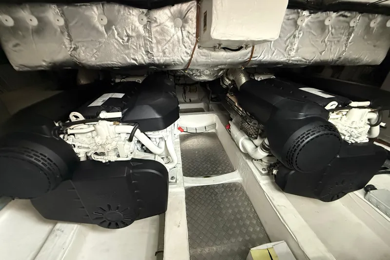 Five 3 Yacht Photos Pics Engine room of 2024 Pardo Yachts 50, featuring dual engines and insulated walls.