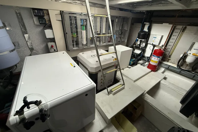 Five 3 Yacht Photos Pics Engine room of 2024 Pardo Yachts 50, featuring equipment and safety gear.