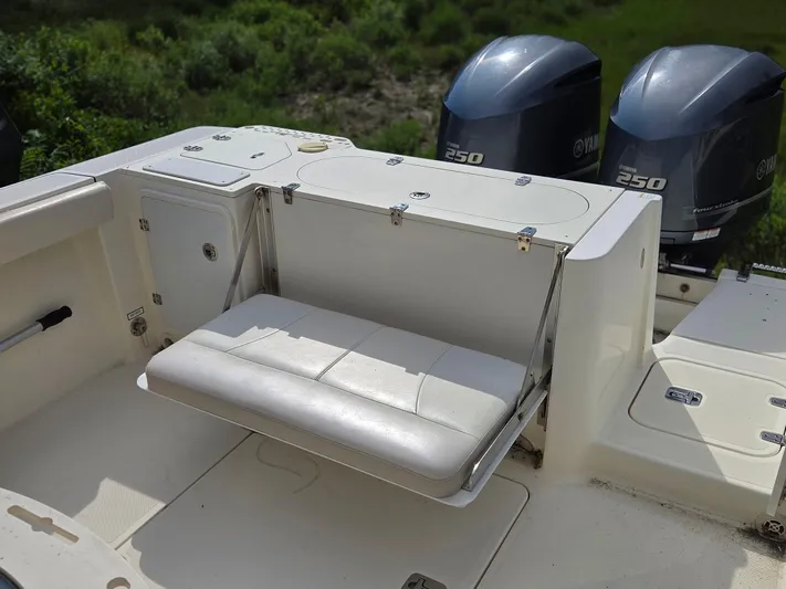  Yacht Photos Pics 2014 Pursuit C 280 Center Console boat with Yamaha 250 engines and foldable seating.