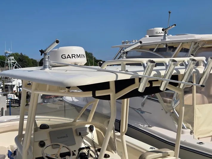  Yacht Photos Pics 2014 Pursuit C 280 Center Console boat with Garmin radar and rod holders.