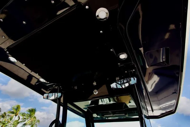  Yacht Photos Pics Blackfin 302 CC 2023 boat canopy with sleek design and integrated lighting.