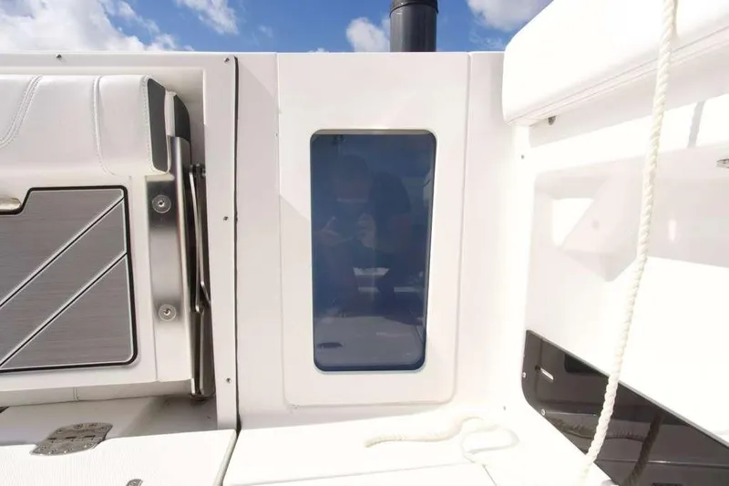  Yacht Photos Pics 2023 Blackfin 302 CC boat interior with sleek design and modern features.