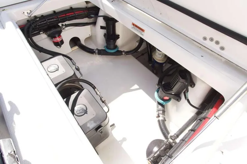  Yacht Photos Pics 2023 Blackfin 302 CC boat engine compartment with wiring and components.