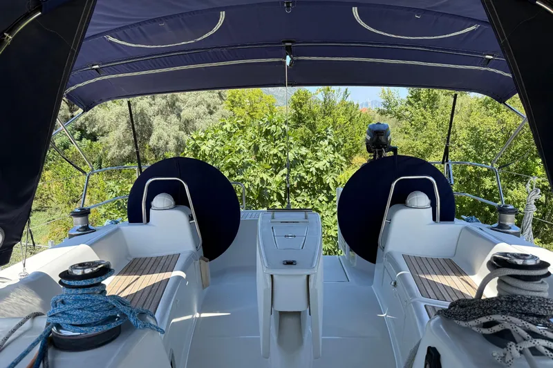  Yacht Photos Pics Cockpit of 2007 Beneteau Oceanis 46 sailboat with dual helm and canopy.