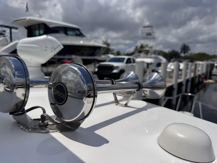  Yacht Photos Pics 2015 Boston Whaler 345 Conquest boat horn with marina background.