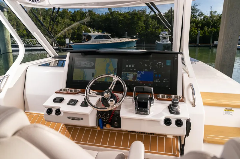 Let&rsquo;s Go Yacht Photos Pics 2025 Regal 38 SAV boat dashboard with advanced navigation and control systems.