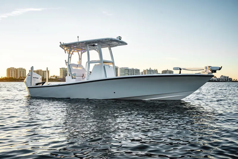  Yacht Photos Pics 2026 Barker Boatworks 26 Open on water with city skyline backdrop.