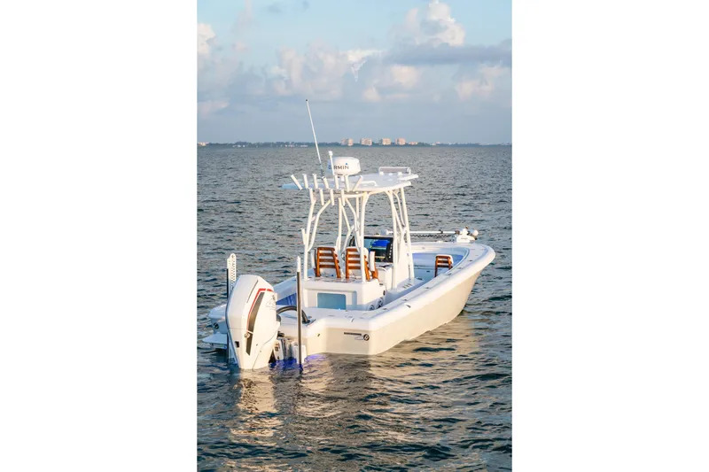  Yacht Photos Pics 2026 Barker Boatworks 26 Open on calm water, showcasing sleek design and modern features.