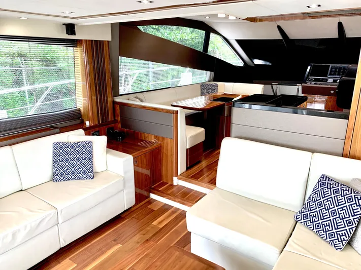  Yacht Photos Pics Luxurious interior of 2016 Sunseeker Manhattan 65 yacht with modern furnishings.