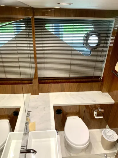  Yacht Photos Pics Luxurious bathroom in 2016 Sunseeker Manhattan 65 yacht with modern fixtures.