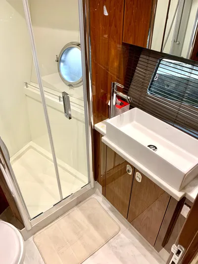  Yacht Photos Pics 2016 Sunseeker Manhattan 65 yacht bathroom with shower and modern sink.