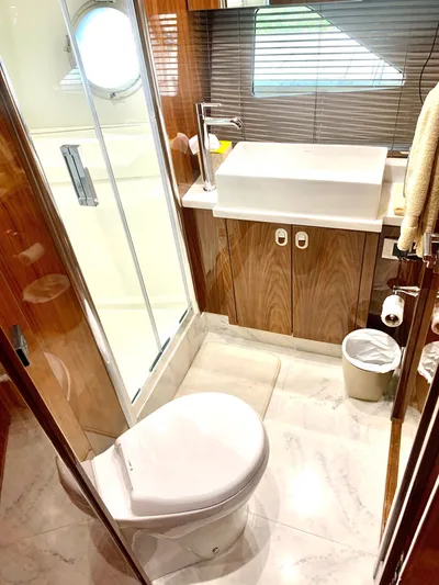  Yacht Photos Pics 2016 Sunseeker Manhattan 65 yacht bathroom with modern fixtures and shower.
