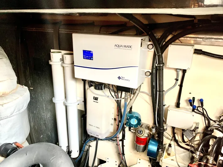  Yacht Photos Pics Engine room of 2016 Sunseeker Manhattan 65 yacht with Aqua Matic watermaker.