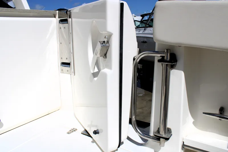  Yacht Photos Pics 2021 Boston Whaler 320 Vantage boat door with stainless steel handle and latch.