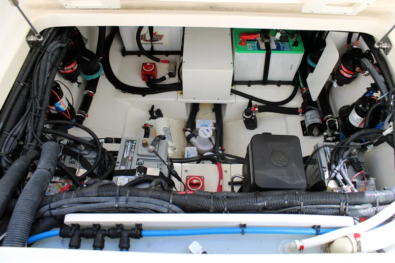  Yacht Photos Pics Engine compartment of a 2021 Boston Whaler 320 Vantage, showcasing wiring and components.