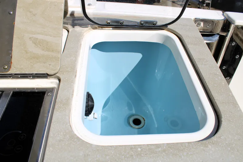  Yacht Photos Pics Livewell on 2021 Boston Whaler 320 Vantage boat, featuring a sleek design.