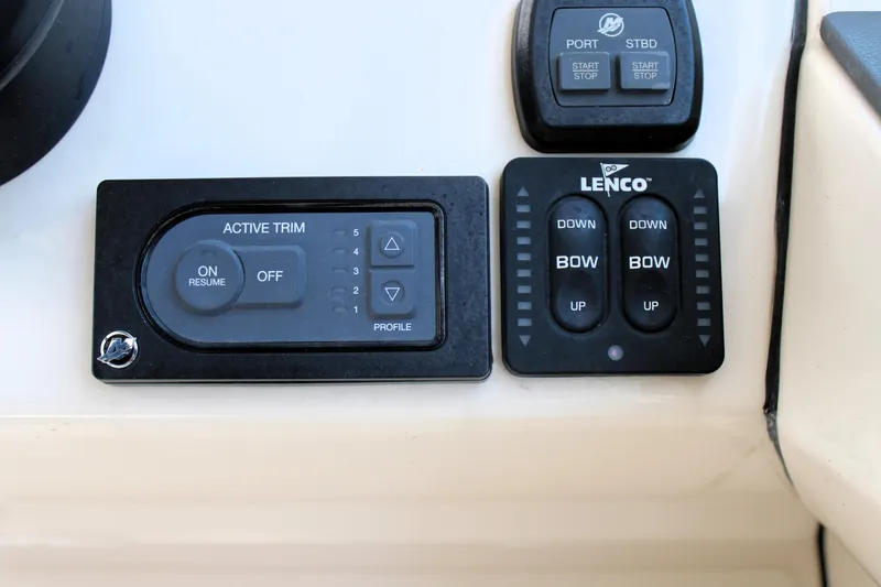  Yacht Photos Pics Control panel of a 2021 Boston Whaler 320 Vantage boat with trim and bow controls.