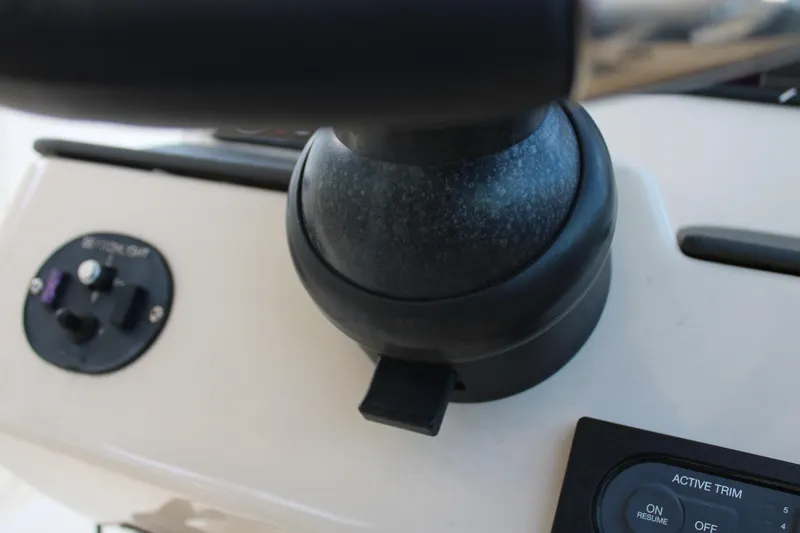  Yacht Photos Pics Close-up of 2021 Boston Whaler 320 Vantage boat controls and steering wheel.