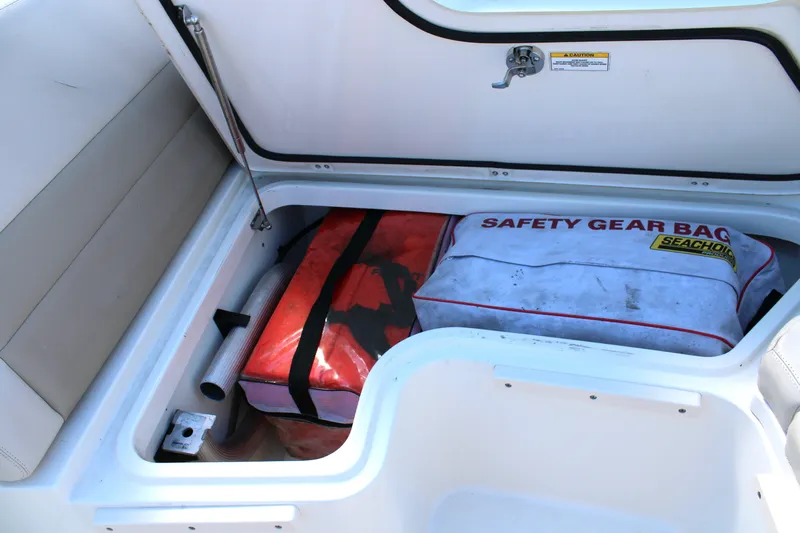  Yacht Photos Pics Storage compartment on 2021 Boston Whaler 320 Vantage with safety gear bag.