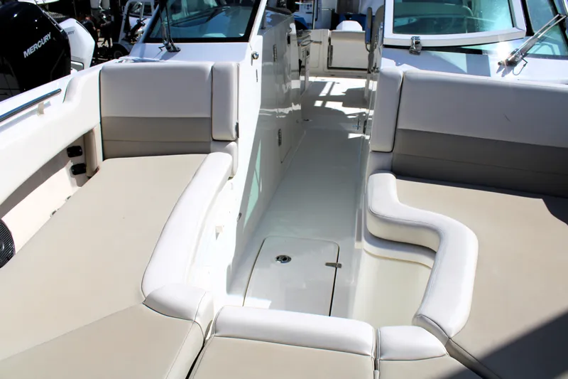  Yacht Photos Pics 2021 Boston Whaler 320 Vantage boat interior with spacious seating and modern design.