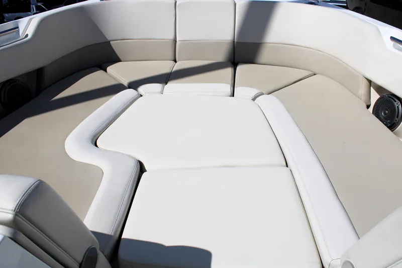  Yacht Photos Pics 2021 Boston Whaler 320 Vantage boat interior with cushioned seating area.