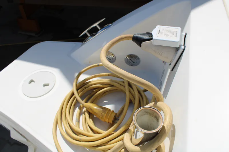  Yacht Photos Pics Power cable on 2021 Boston Whaler 320 Vantage boat deck.
