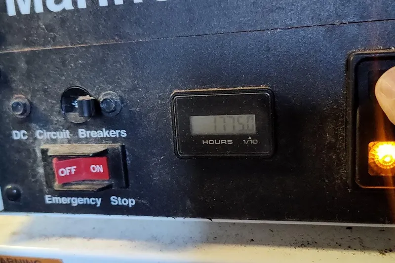  Yacht Photos Pics Control panel of a 2007 Sea Ray 58 Sedan Bridge with hour meter and switches.