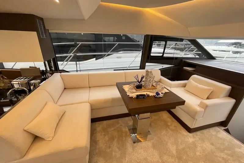  Yacht Photos Pics Luxurious interior of a 2020 Prestige 520 yacht with elegant seating and decor.